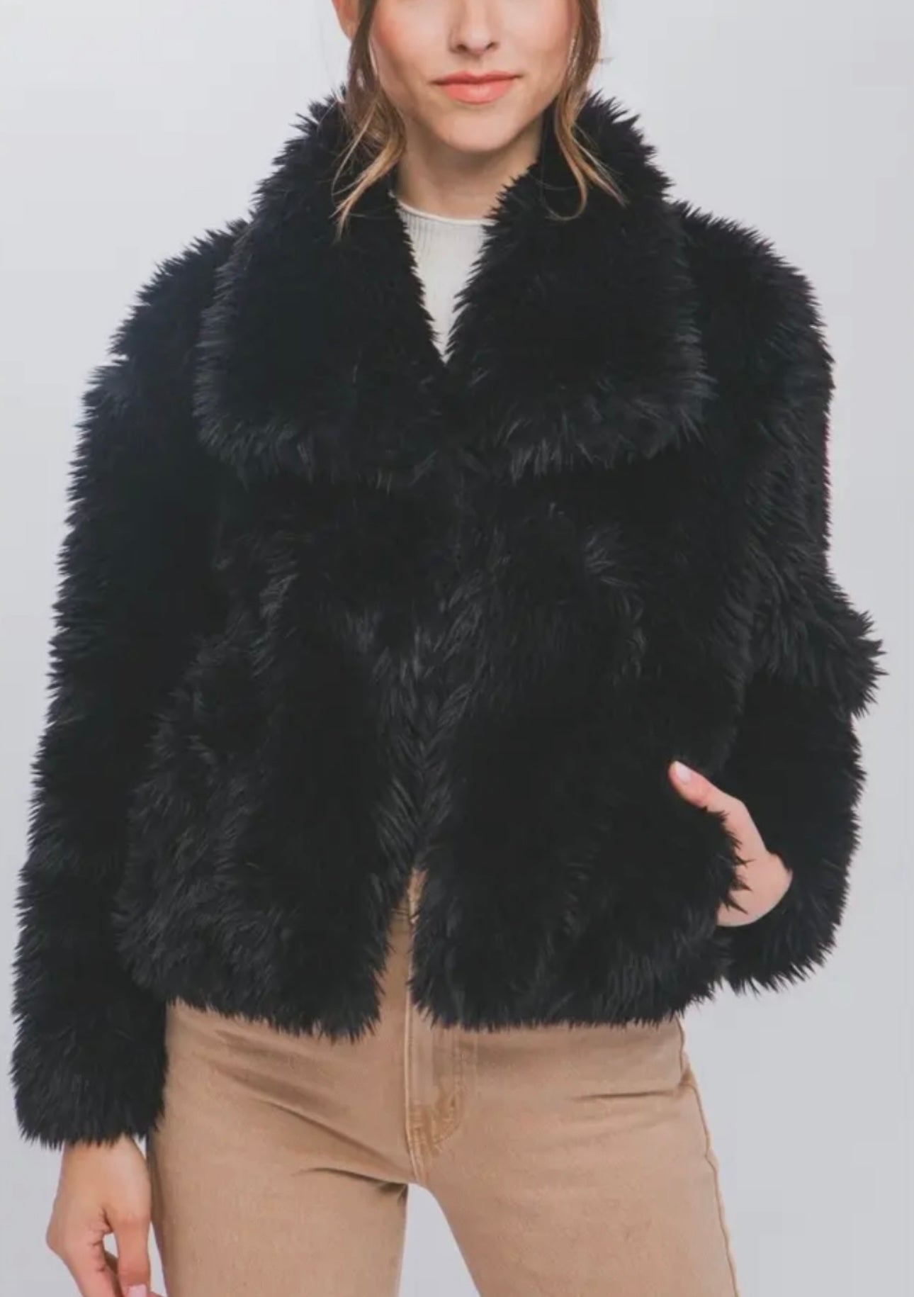 black faux fur coat